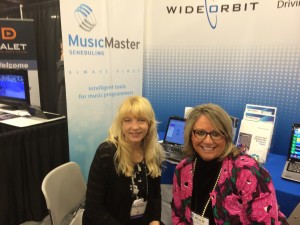 Marianne and Melanie in the Wid Orbit booth at NRB