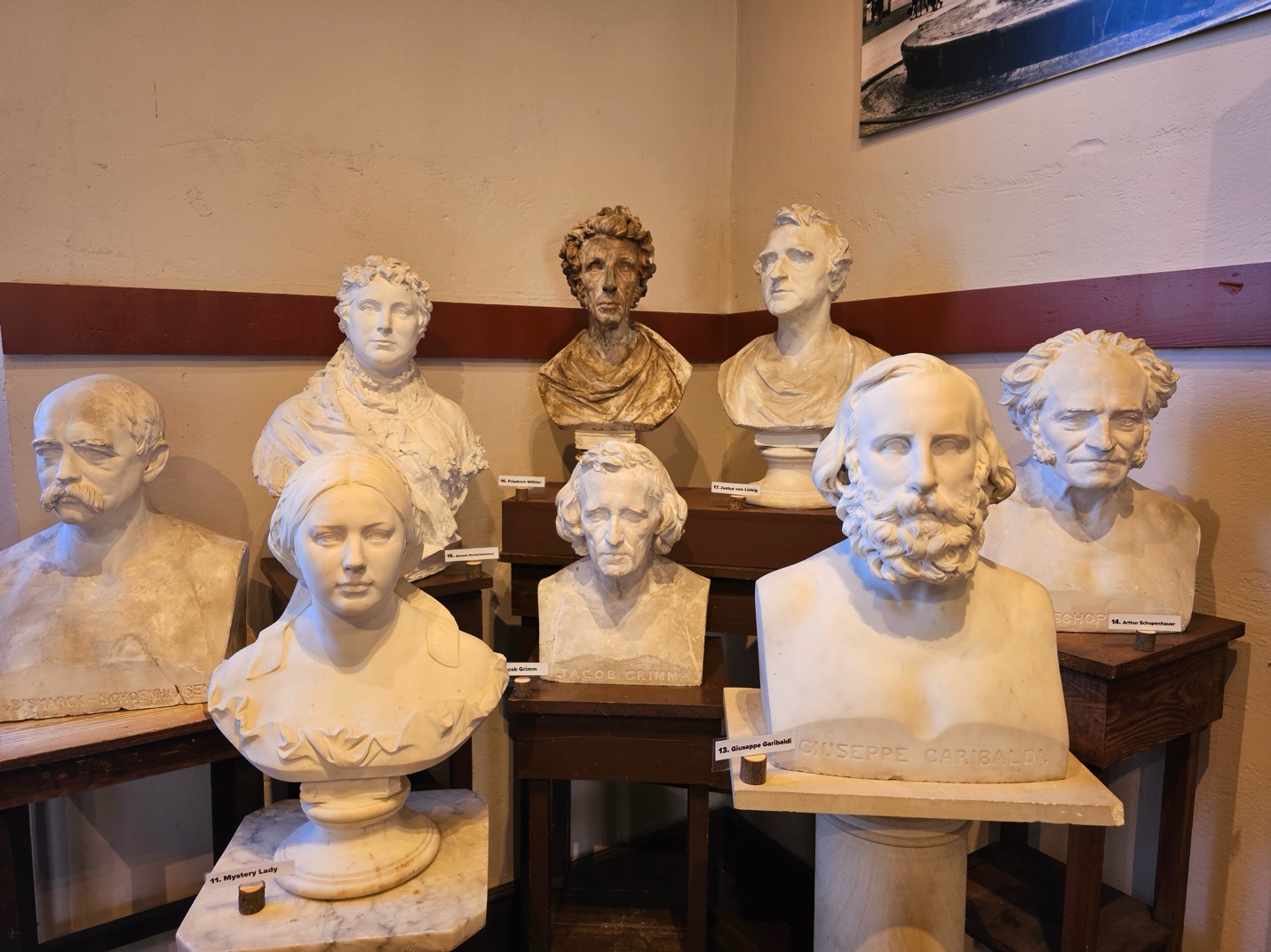 A group of statues on display

Description automatically generated